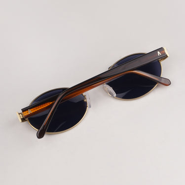 Lentes de sol Rond dorado perfil lateral | Ábaco